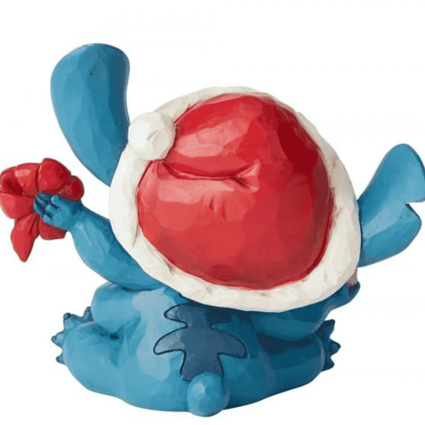 Figura de Stitch con Gorro de Santa Bad Wrap Disney Traditions