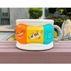 Infant Planet Tambor Multijuegos – Juguete musical con luces y modos de juego (18m+)