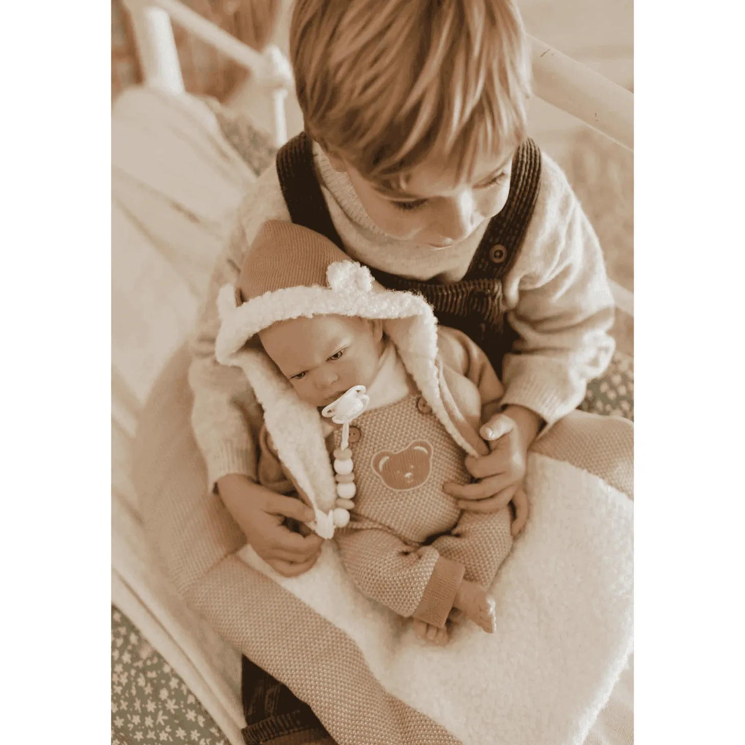 Muñeca Bebé Reborn Gadea rosa con manta