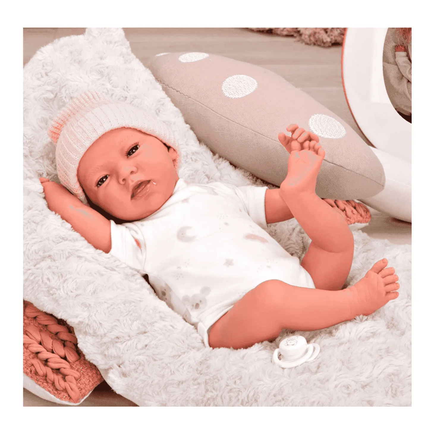 Muñeca Con Peso Elegance Dafne Con Estampado En Rosa Con Cojín